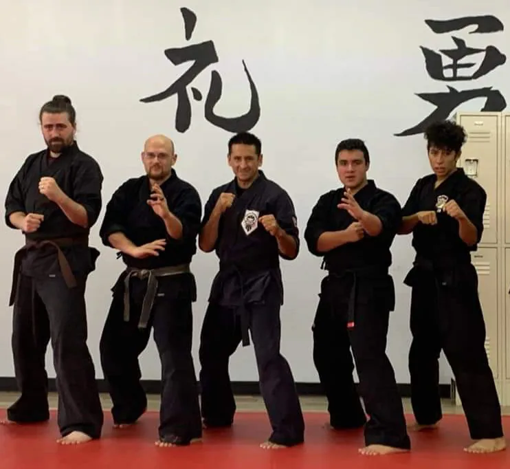 The Legacy martial arts crew together in the dojo